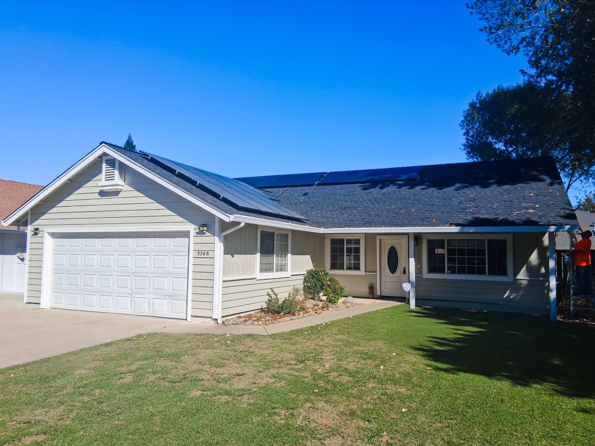 Professional painters working on residential home exterior Redding CA
